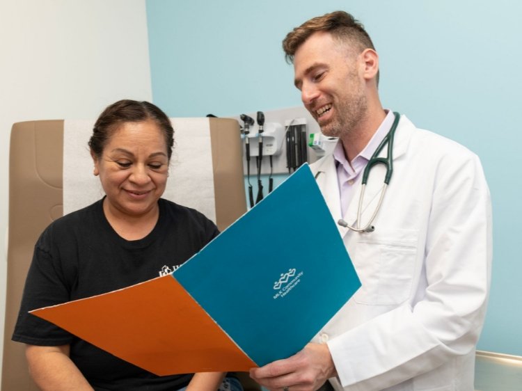 Photo of a female patient with a male doctor