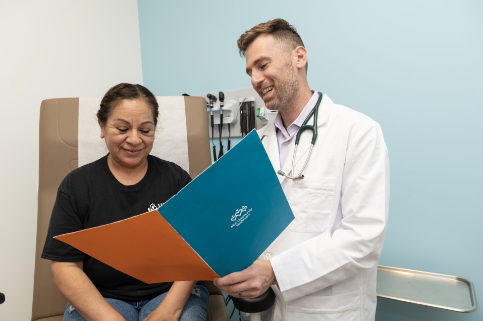 MLKCH Doctor with patient at Rosecrans clinic.