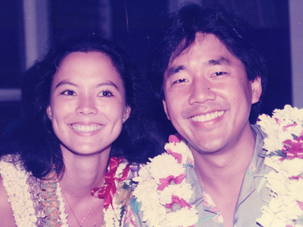Asian man and woman smiling 